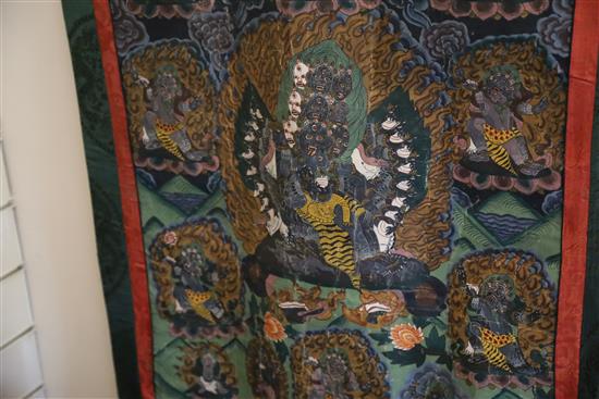 A thangka depicting a Buddhist wrathful deity, Tibet, first half 20th century, Total size 106cm x 72cm